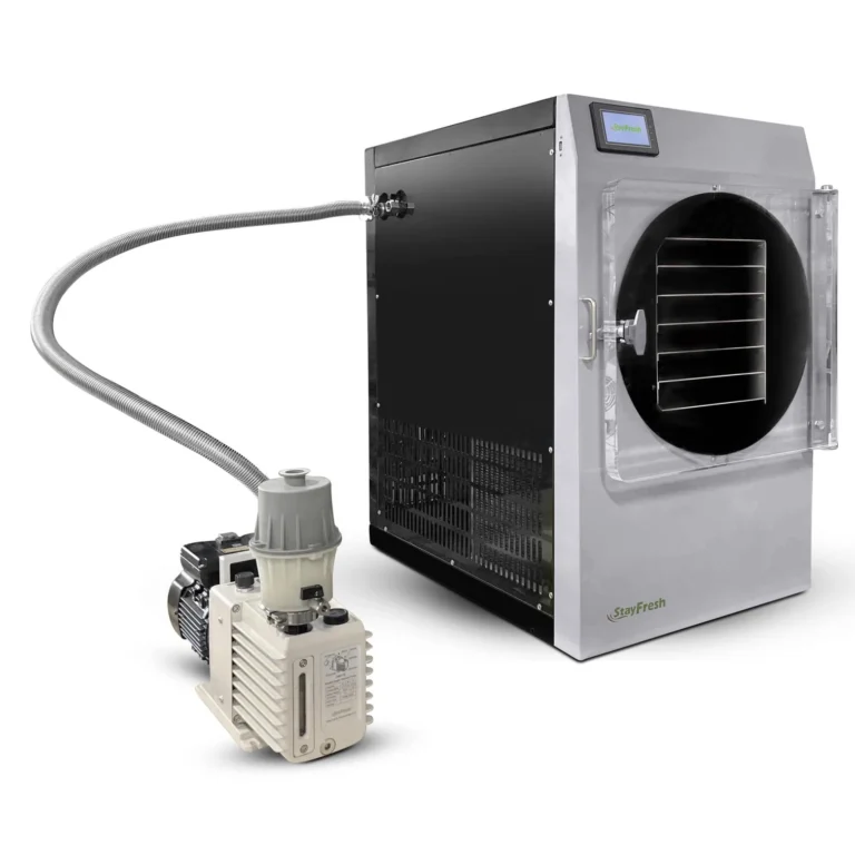 Stay Fresh Mega freeze dryer in stainless steel with the DRV10 pump connected by a flexible vacuum line